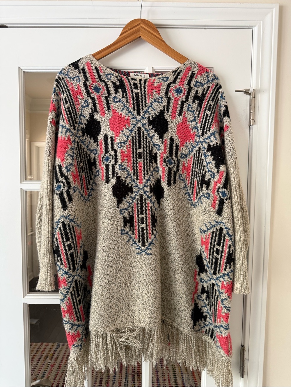Miracle Cream Off-the-Shoulder Sweater with Pink, Black & Blue Pattern